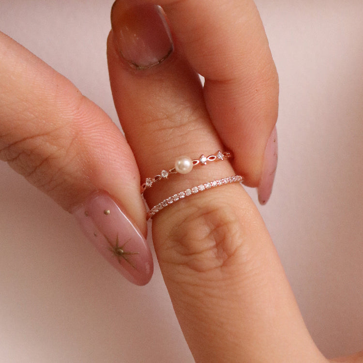 Enhance your elegance with our pearl double layered ring for women. A chic blend of classic pearls and modern design, perfect for daily wear or gifting.