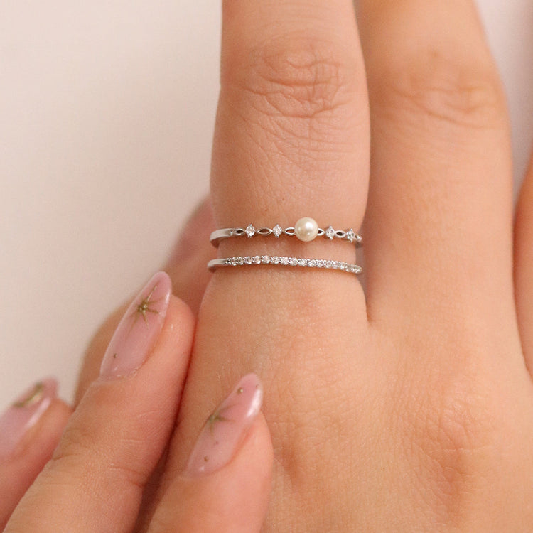 Enhance your elegance with our pearl double layered ring for women. A chic blend of classic pearls and modern design, perfect for daily wear or gifting.