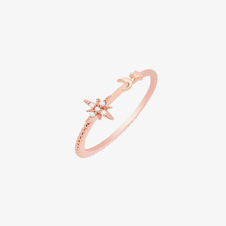 Elegant moon and star ring on a woman&