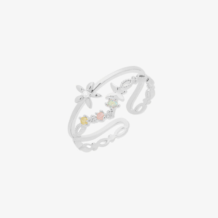 Double pastel flower ring for women in silver with dainty floral design and subtle colors.