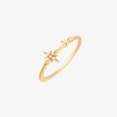 Elegant moon and star ring on a woman&